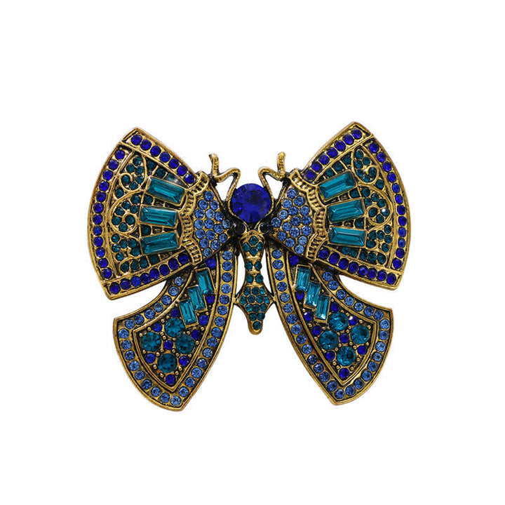 Broche de mariposa con cristales de imitación para mujer