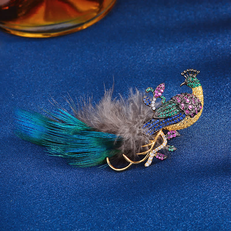Broche de plumas de pavo real con diamantes de imitación brillantes para mujer