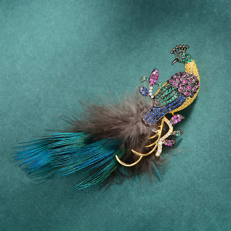 Broche de plumas de pavo real con diamantes de imitación brillantes para mujer