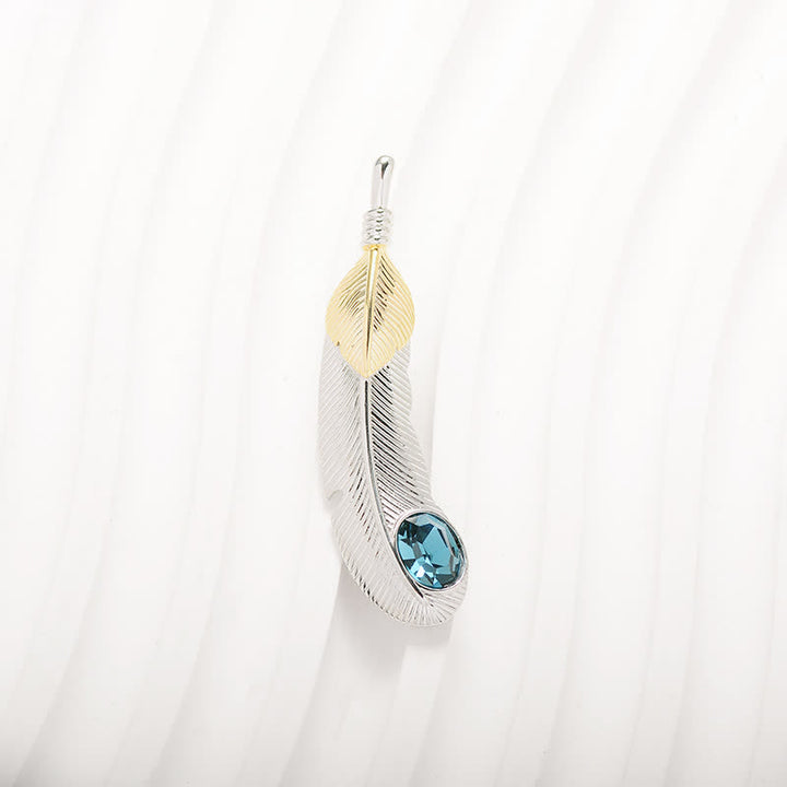 Broche unisex con forma de pluma de cristal azul sintético