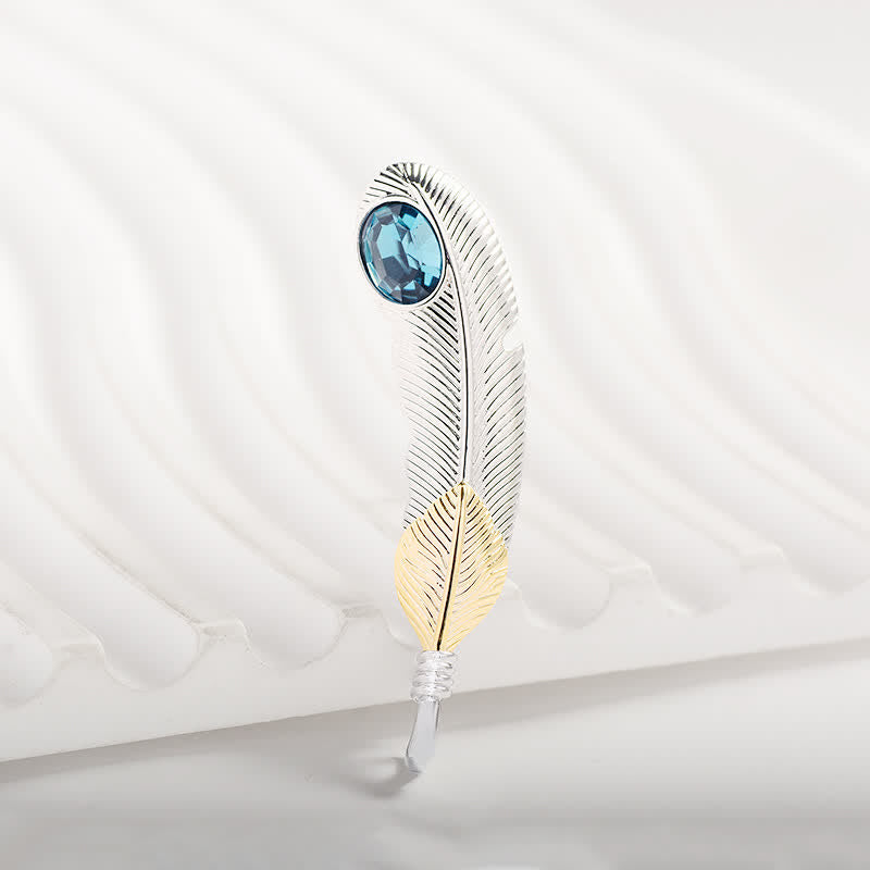 Broche unisex con forma de pluma de cristal azul sintético