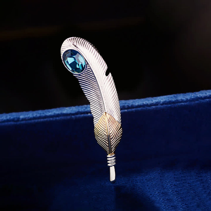 Broche unisex con forma de pluma de cristal azul sintético