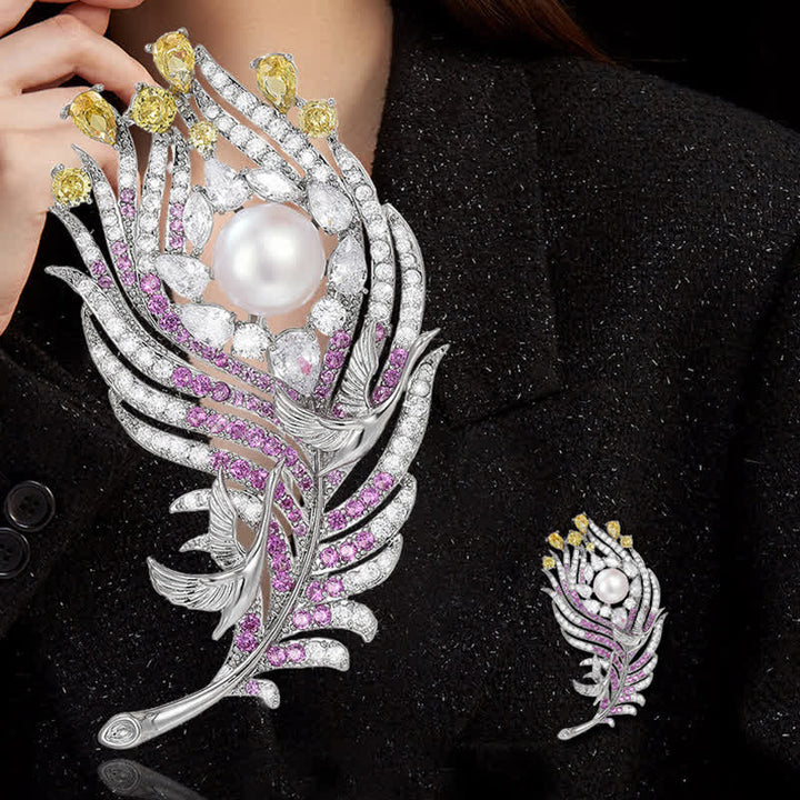 Broche unisex con forma de pluma de perla y diamantes de imitación rosas y amarillos