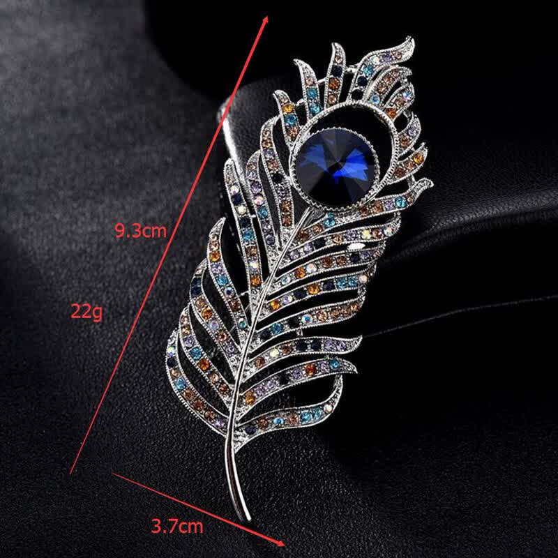 Broche unisex con forma de pluma de fénix y diamantes de imitación de colores.