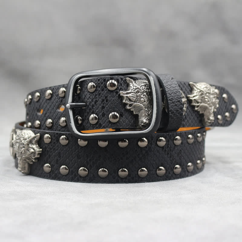 Cinturón de cuero con estampado de piel de serpiente negra y remaches de cabeza de lobo en plata antigua