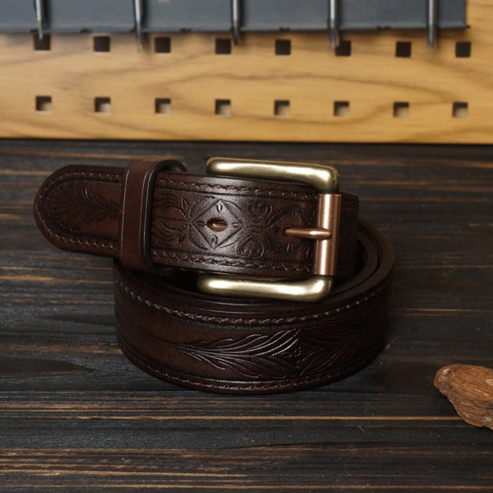 Cinturón de cuero con flor en relieve estilo western y hebilla de latón macizo