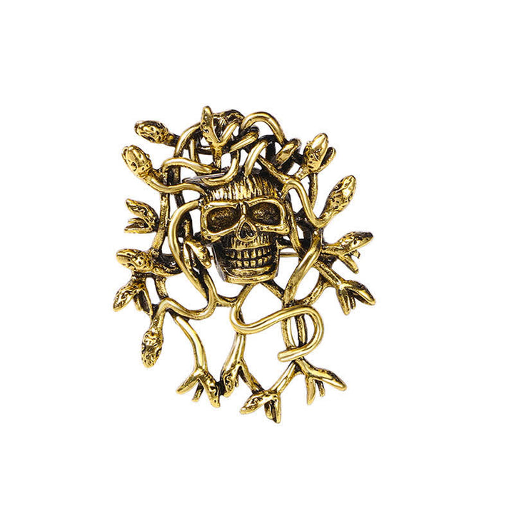 Broche exagerado de calavera con cabeza de serpiente envuelta