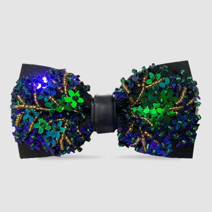 Pajarita de lentejuelas con forma de flor verde y azul brillante