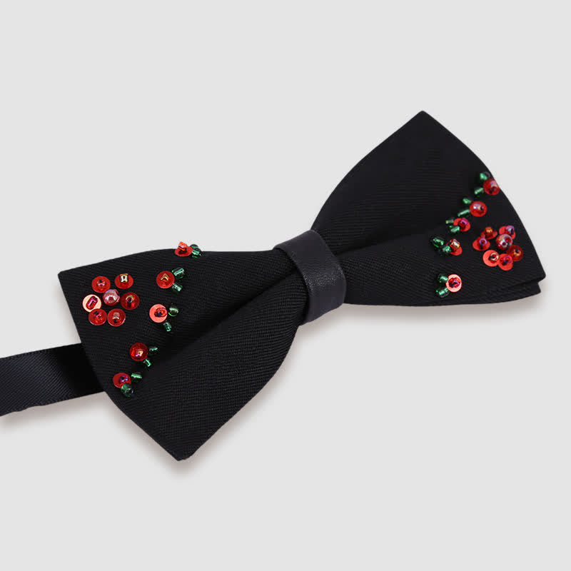 Pajarita negra con bordado de cuentas y forma de flor