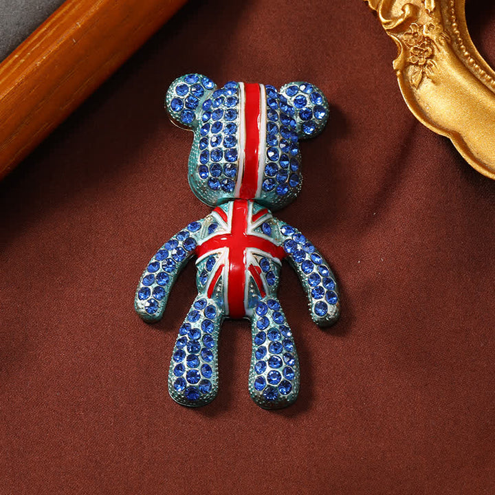 Exquisito broche de cristal con forma de oso y bandera británica