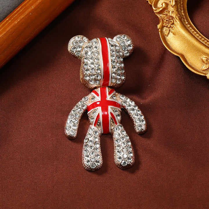 Exquisito broche de cristal con forma de oso y bandera británica