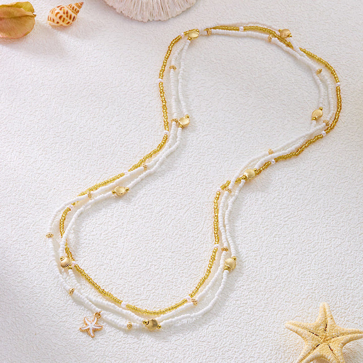 Cadena de cintura bohemia de playa para mujer con múltiples capas de cuentas de concha y estrella de mar