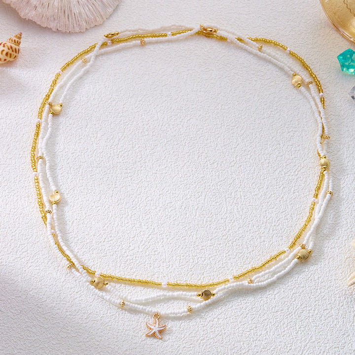 Cadena de cintura bohemia de playa para mujer con múltiples capas de cuentas de concha y estrella de mar