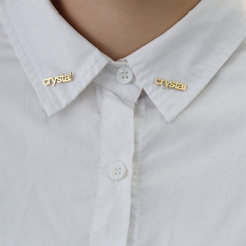 Un par de gemelos con broche personalizado de oro con tu nombre