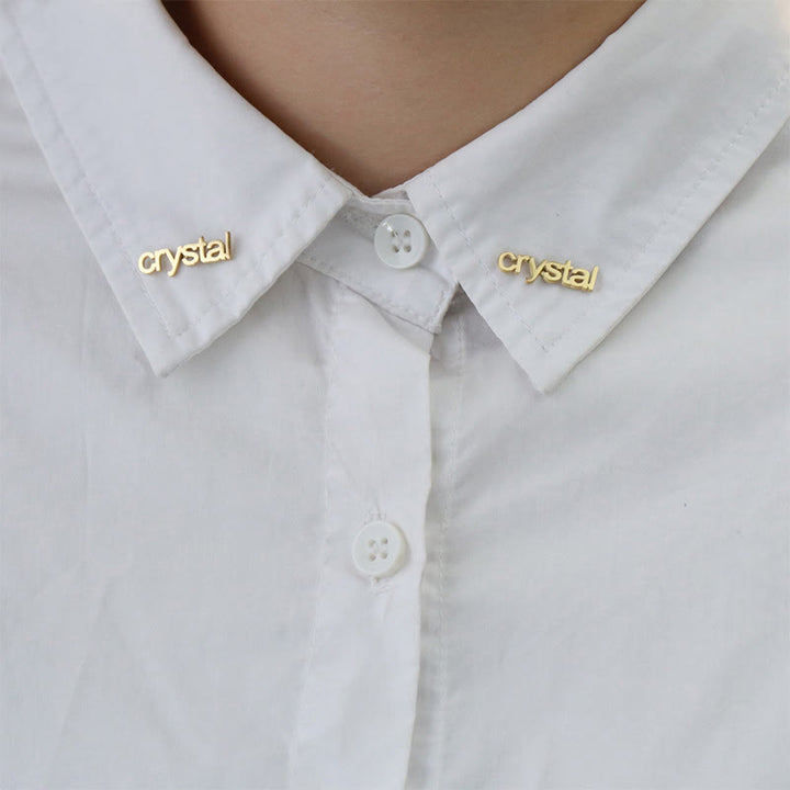Un par de gemelos con broche personalizado de oro con tu nombre