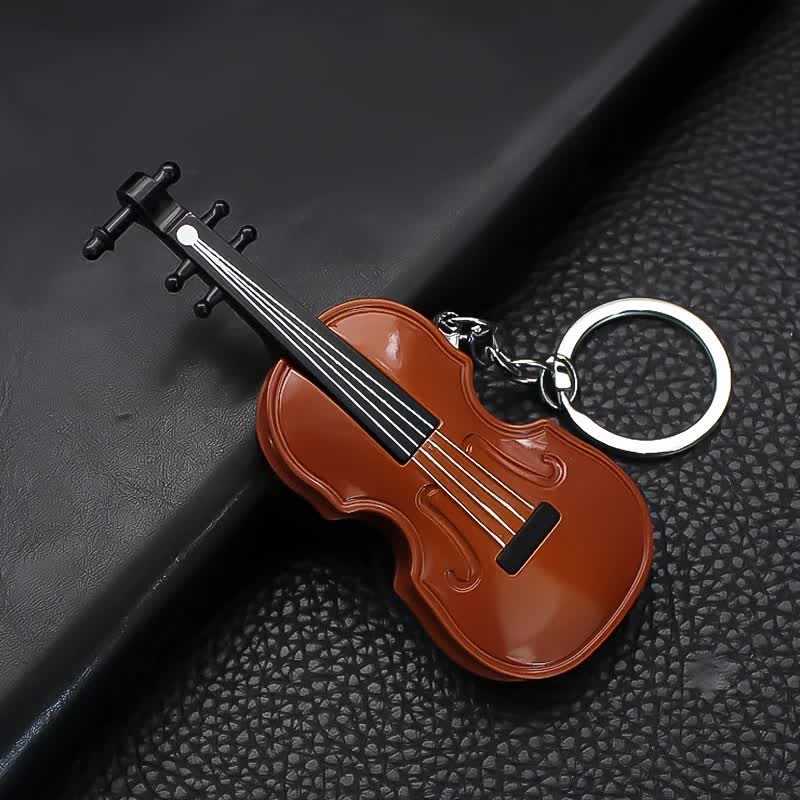 Lindo llavero con encendedor de butano y diseño de violín.