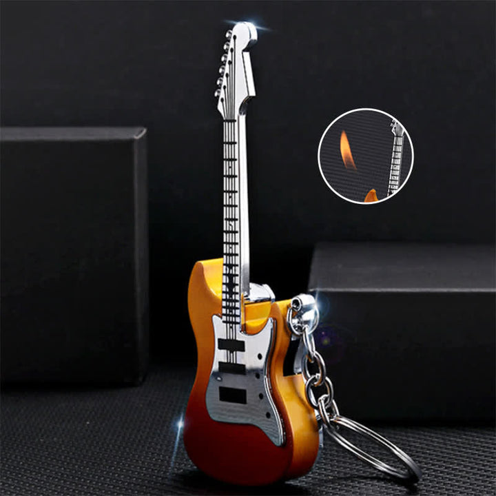 Llavero inflable con forma de guitarra y encendedor de butano.