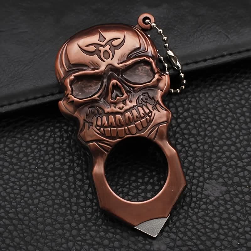 Llavero multifuncional con encendedor de butano y cara de calavera noble