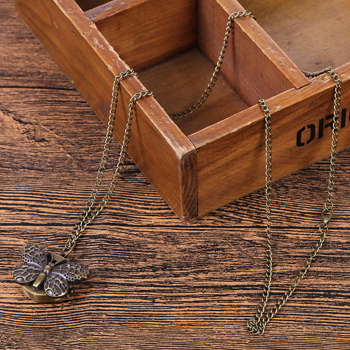 Reloj de bolsillo de cuarzo con forma de mariposa, estilo retro creativo - image 3