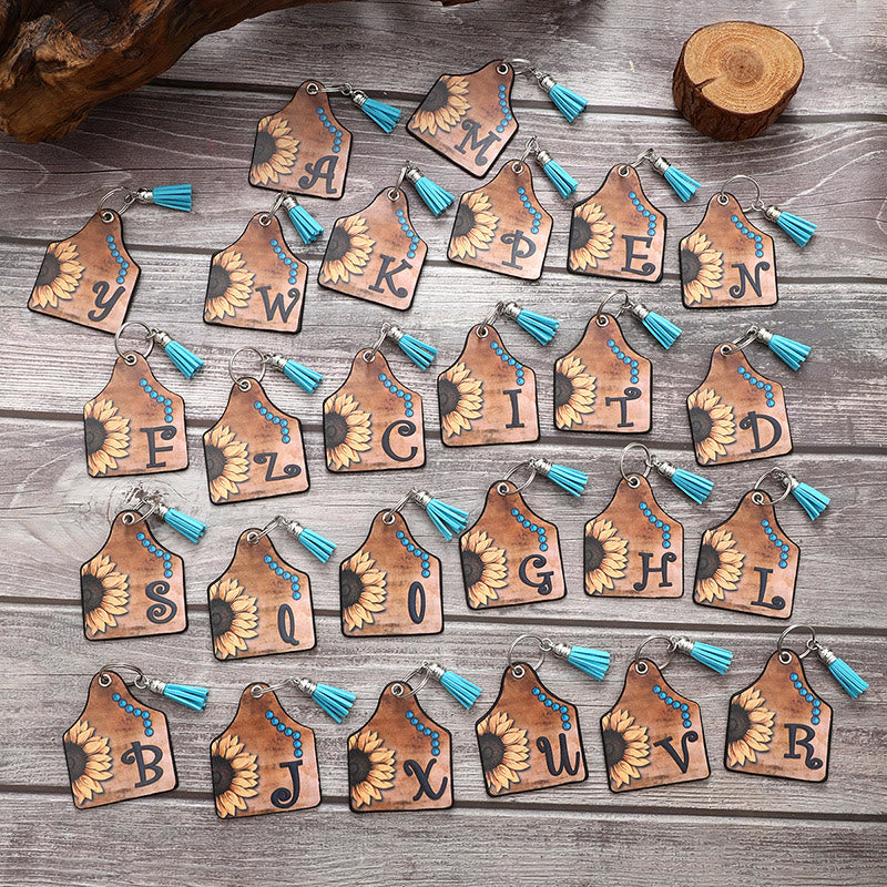 Llavero de cuero con borlas de girasol y letras de estilo occidental - image 1