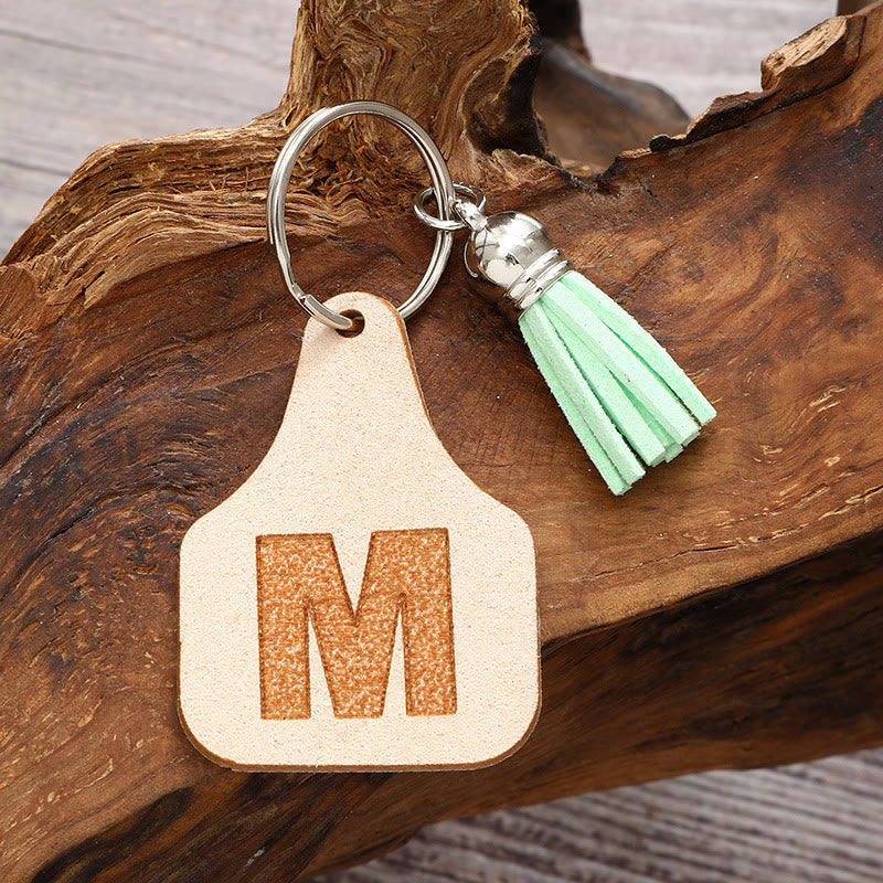 Llavero con borla verde y letras de estilo minimalista de granja - image 1