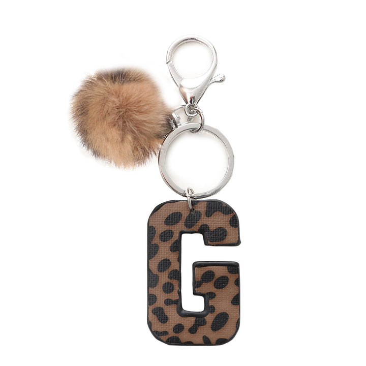 Llavero de cuero con letras y estampado de leopardo estilo occidental con bola de peluche - G - image 8
