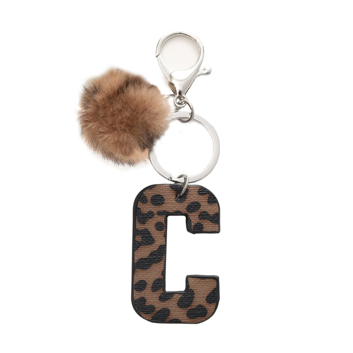 Llavero de cuero con letras y estampado de leopardo estilo occidental con bola de peluche - C - image 5