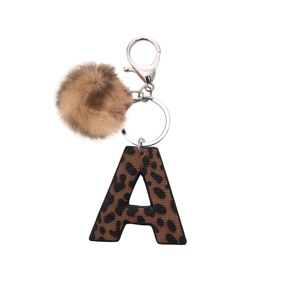 Llavero de cuero con letras y estampado de leopardo estilo occidental con bola de peluche - A - image 2
