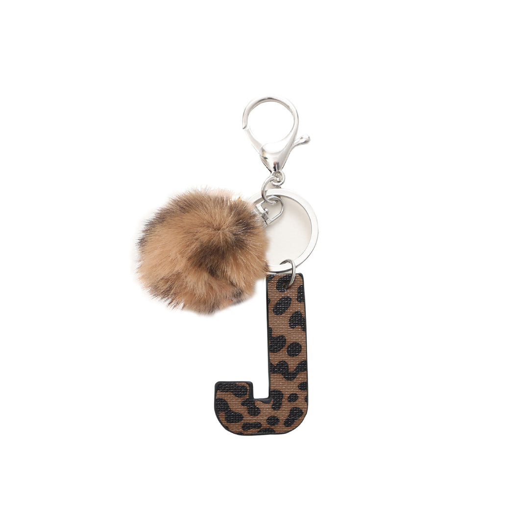 Llavero de cuero con letras y estampado de leopardo estilo occidental con bola de peluche - J - image 11