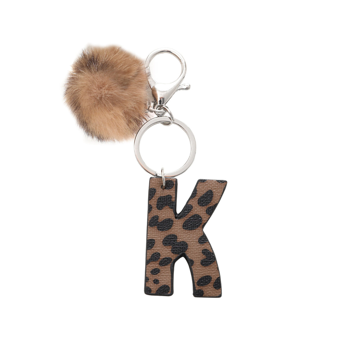 Llavero de cuero con letras y estampado de leopardo estilo occidental con bola de peluche - K - image 13