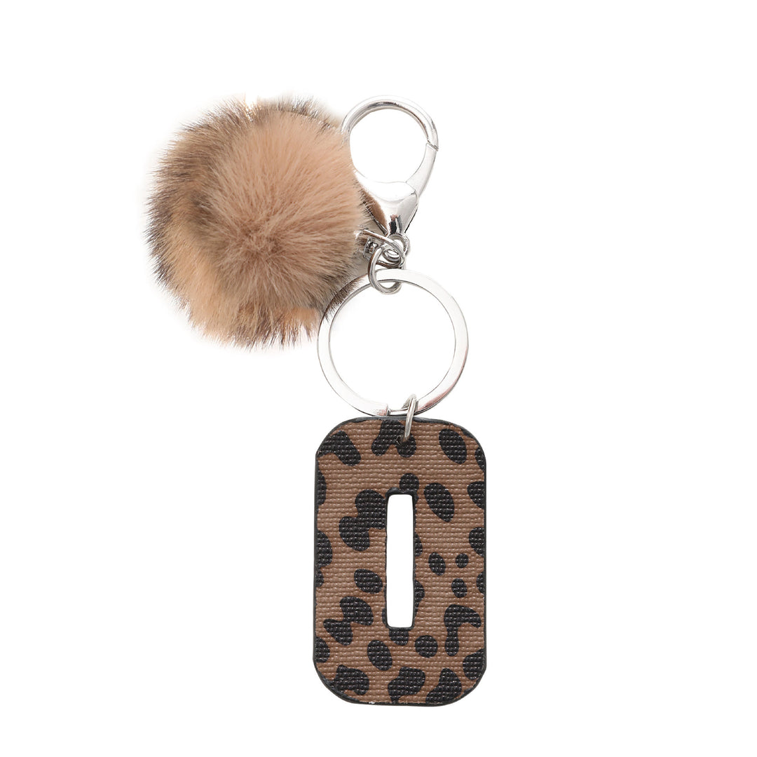 Llavero de cuero con letras y estampado de leopardo estilo occidental con bola de peluche - O - image 17