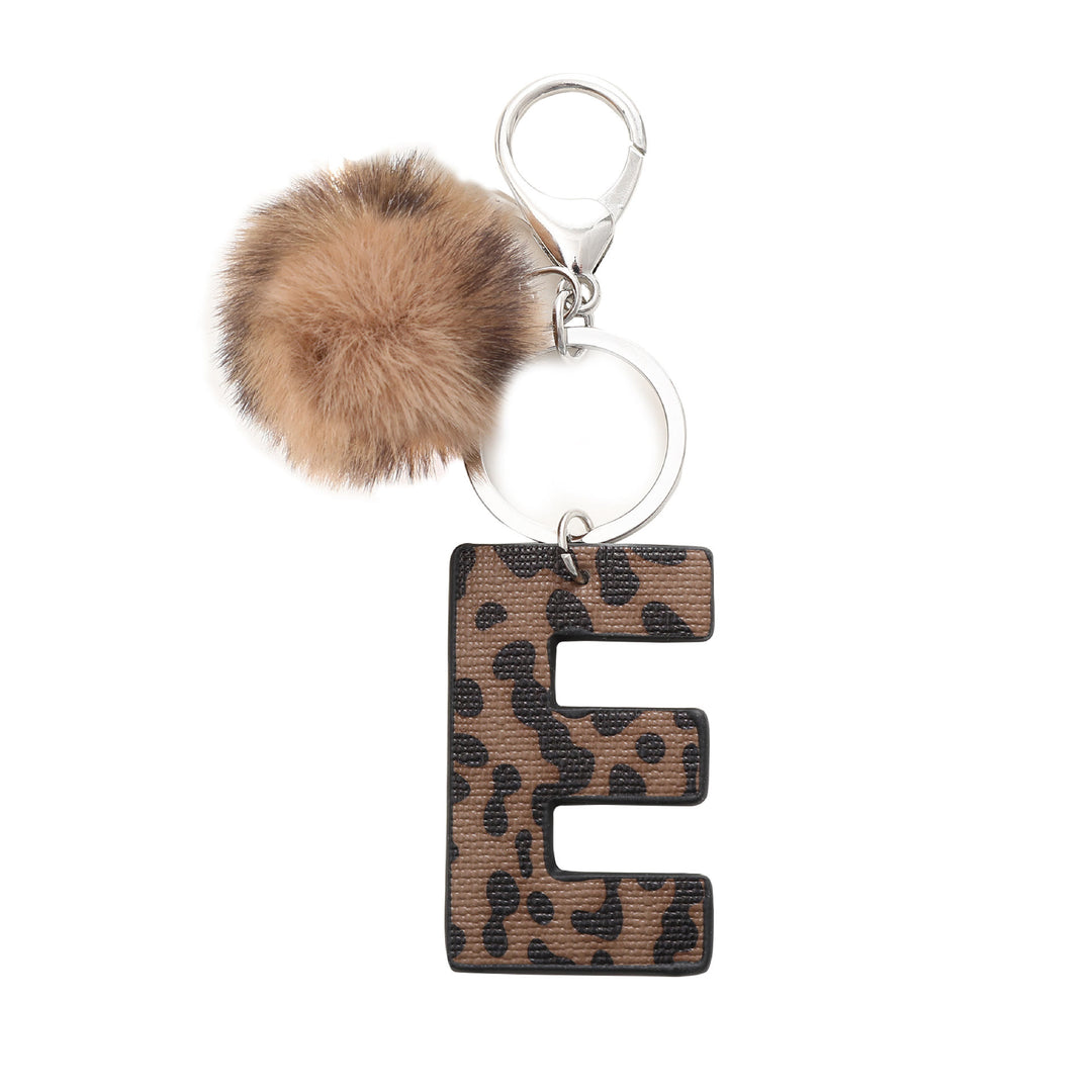 Llavero de cuero con letras y estampado de leopardo estilo occidental con bola de peluche - E - image 7