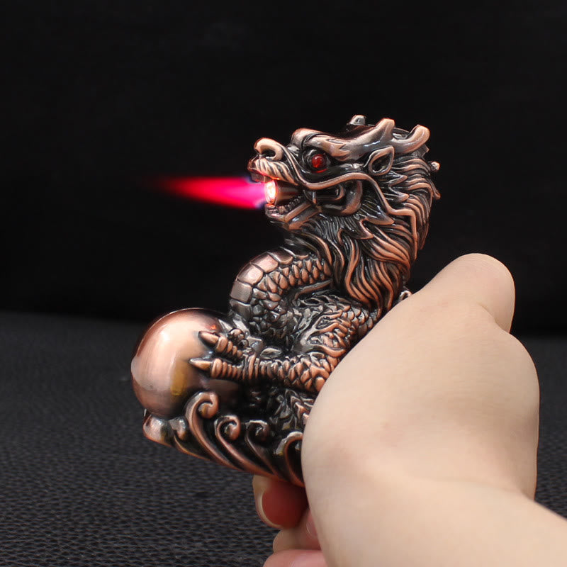 Encendedor de butano resistente al viento con diseño de dragón jugando con la perla en relieve - image 1