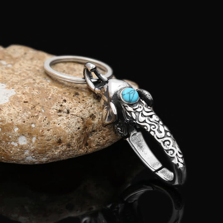 Llavero con cabeza de elefante y piedra turquesa sintética - image 3