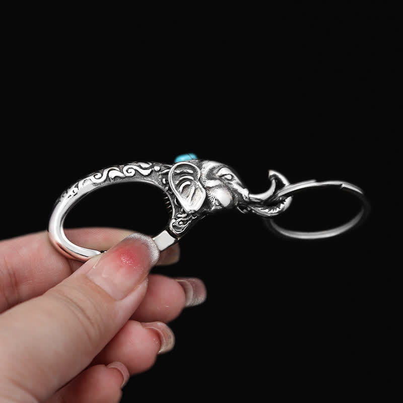 Llavero con cabeza de elefante y piedra turquesa sintética - image 2
