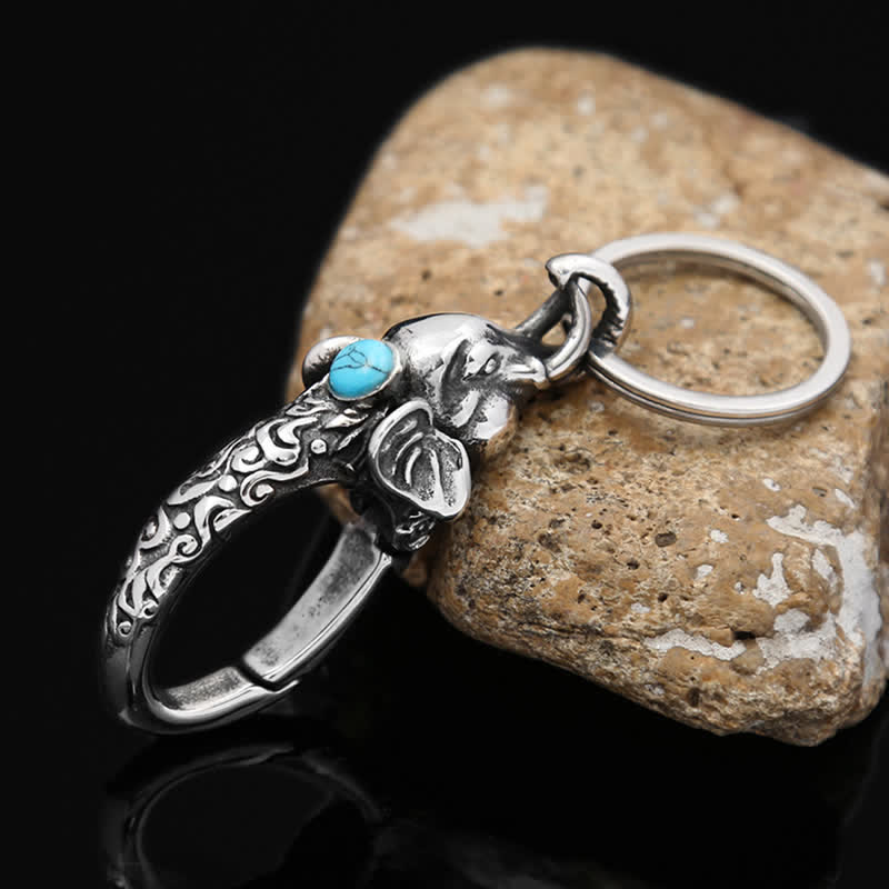 Llavero con cabeza de elefante y piedra turquesa sintética - Plata antigua - image 0