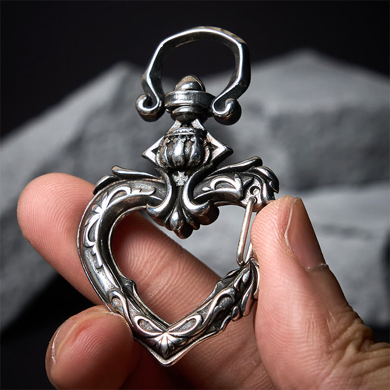 Llavero vintage de metal pulido con forma de corazón giratorio - image 1