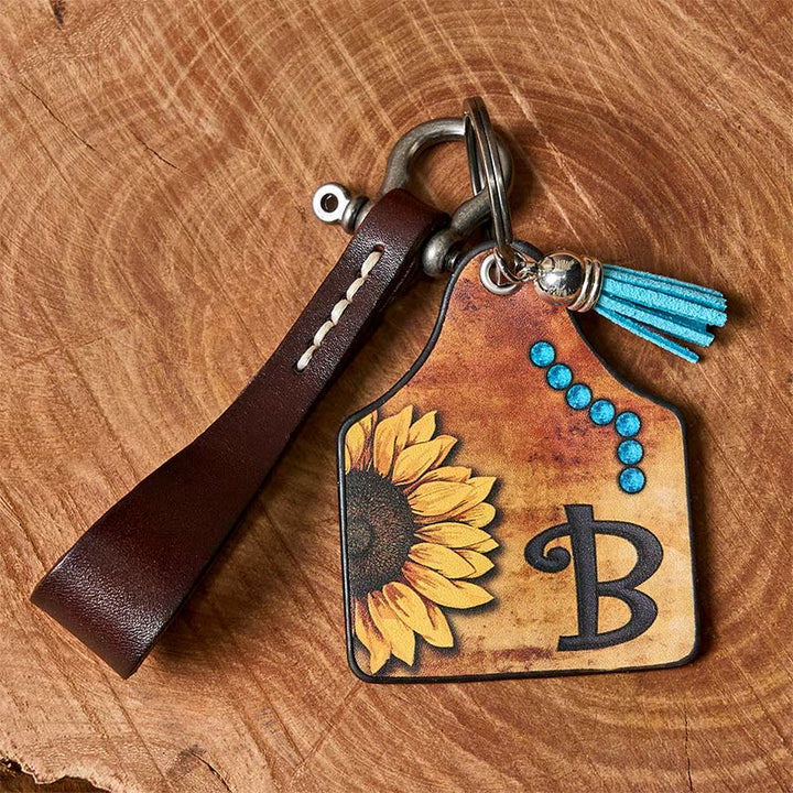 Llavero con hebilla de herradura y colgante con estampado de letras de girasoles occidentales - image 5