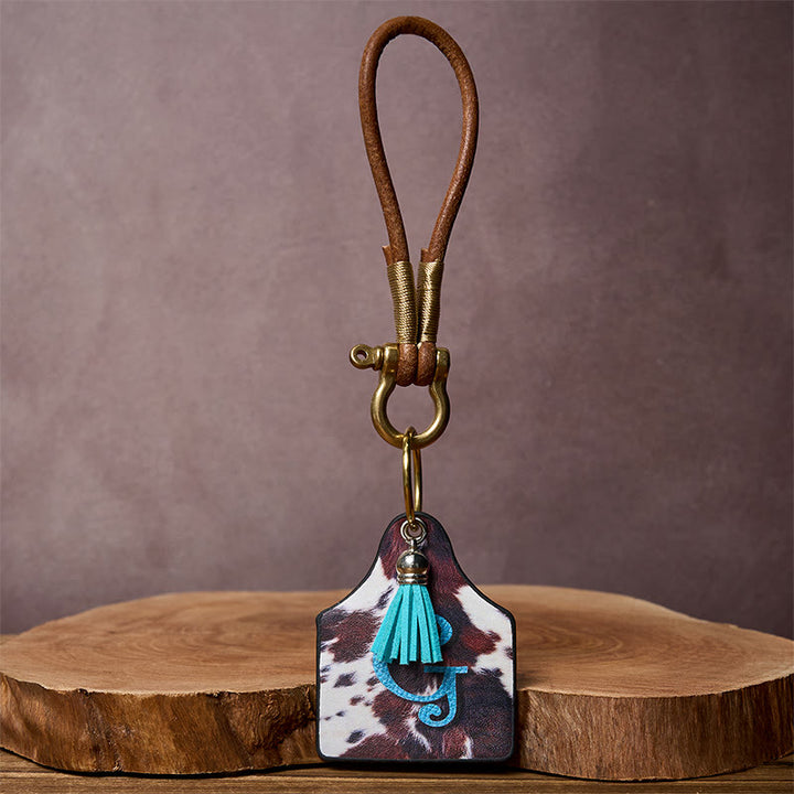 Llavero con hebilla de herradura y colgante con estampado de vaca occidental - image 6