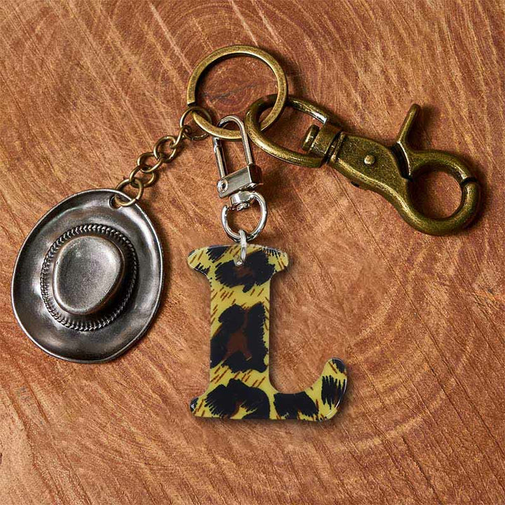 Llavero con colgante de sombrero de vaquero y letra con estampado de leopardo - Llavero de latón + sombrero plateado - L - image 19