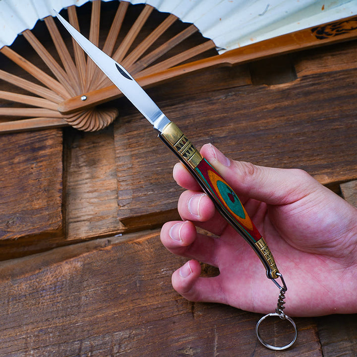 Navaja plegable de latón de colores con forma de mano de Buda y collar de piedra roja - image 1