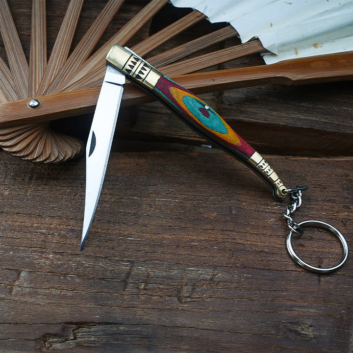 Navaja plegable de latón de colores con forma de mano de Buda y collar de piedra roja - image 5