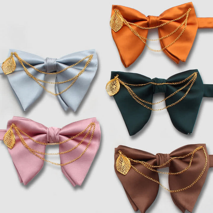 Pajarita extragrande con punta y decoración de hoja de oro, con cadena. - image 0