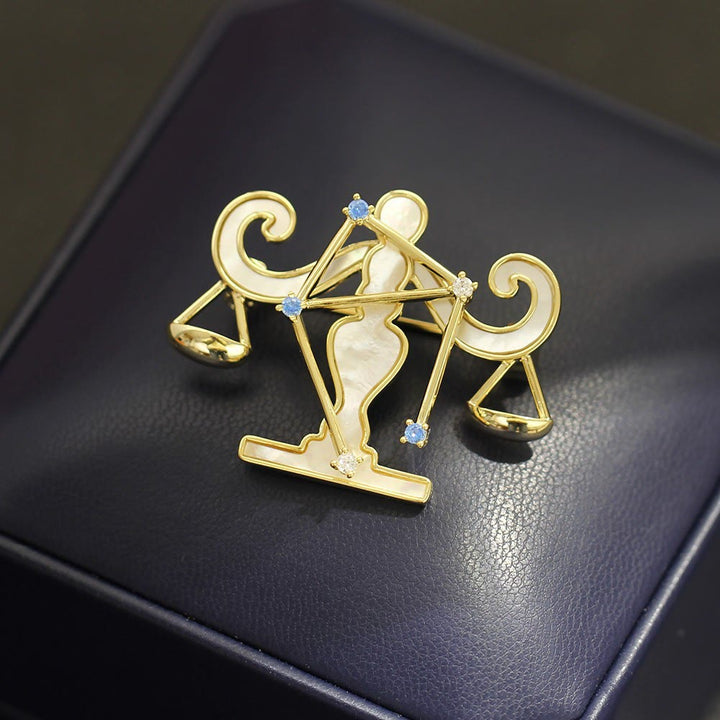 Broche de oro con nácar y cristal azul de las 12 constelaciones - image 13