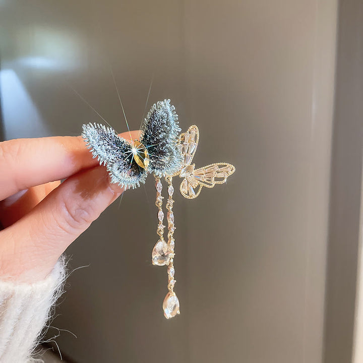 Broche elegante con borlas de mariposa azul para mujer