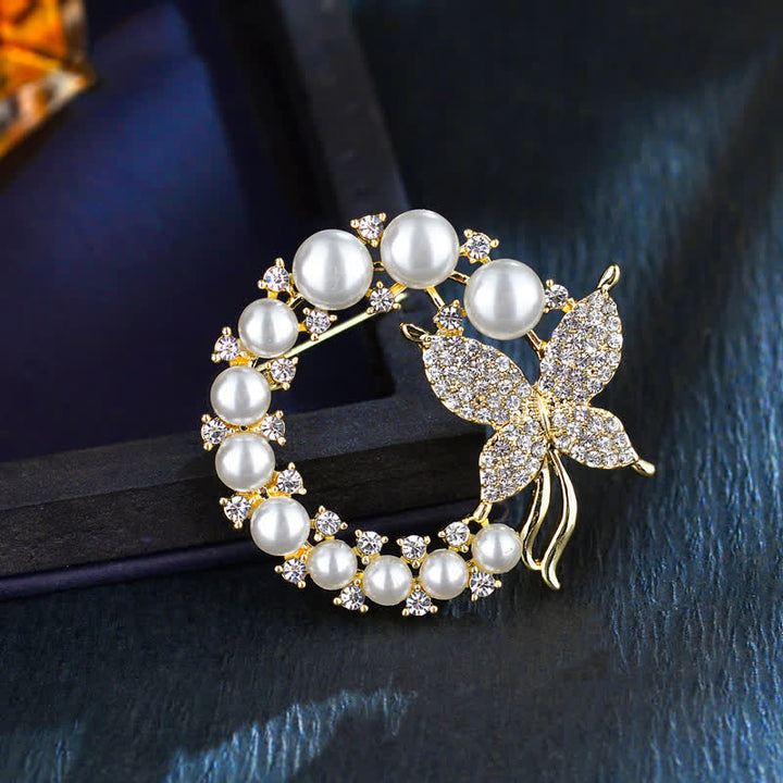 Broche de mariposa dorada con corona de perlas para mujer