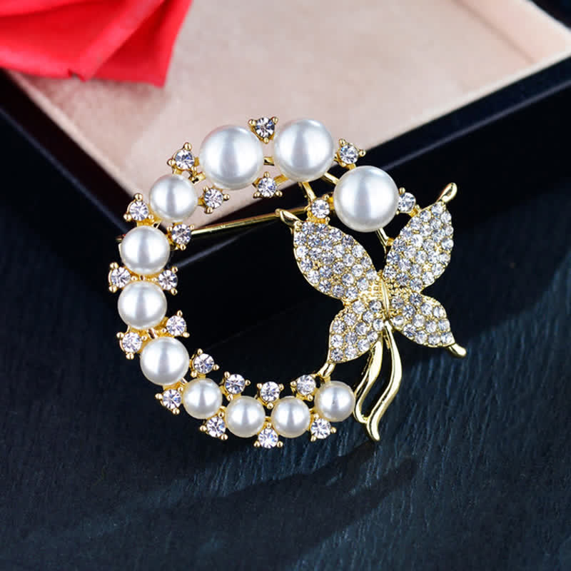 Broche de mariposa dorada con corona de perlas para mujer