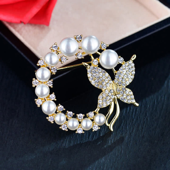 Broche de mariposa dorada con corona de perlas para mujer