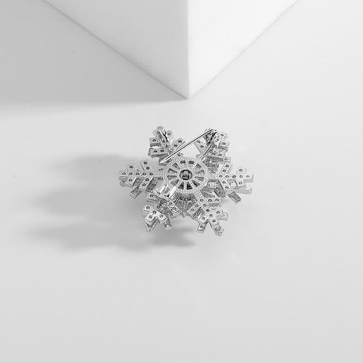 Broche de copo de nieve giratorio para mujer