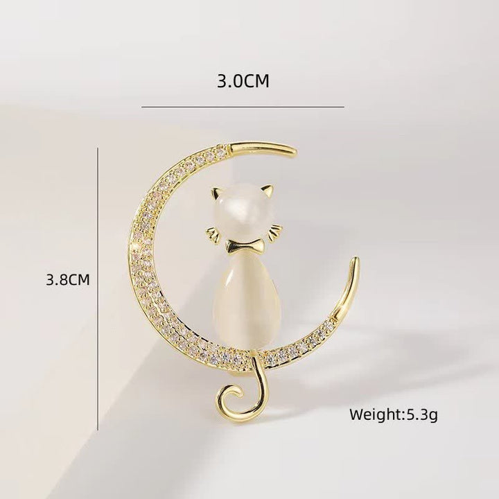 Broche de mujer con forma de luna y gatito en forma de menisco